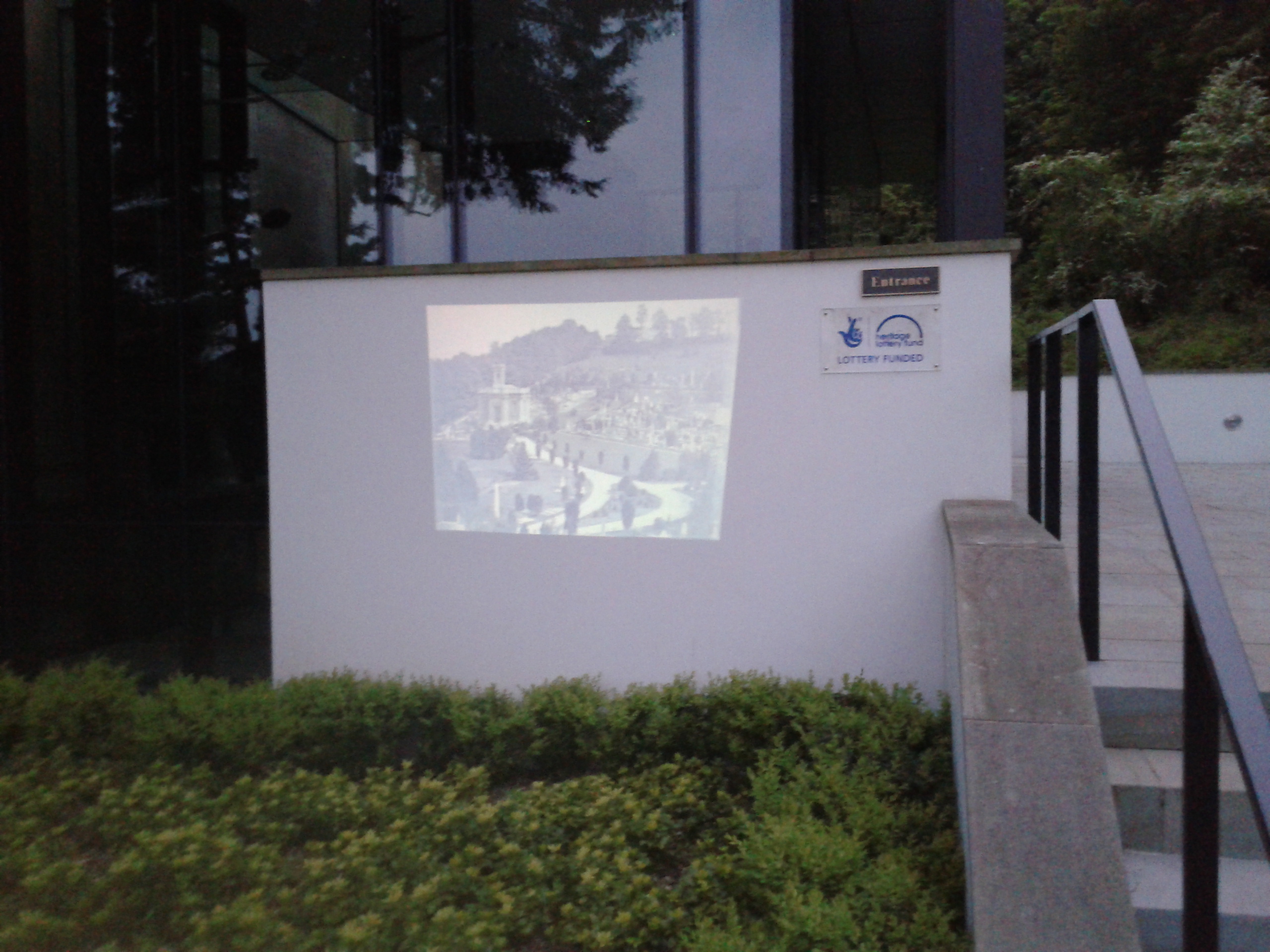 Projector linked to tablet shows historic landscape of Arnos Vale.
