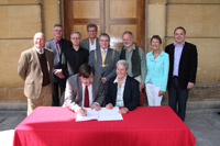 Representatives from AVCT and Bristol City Council sign the 125 lease.