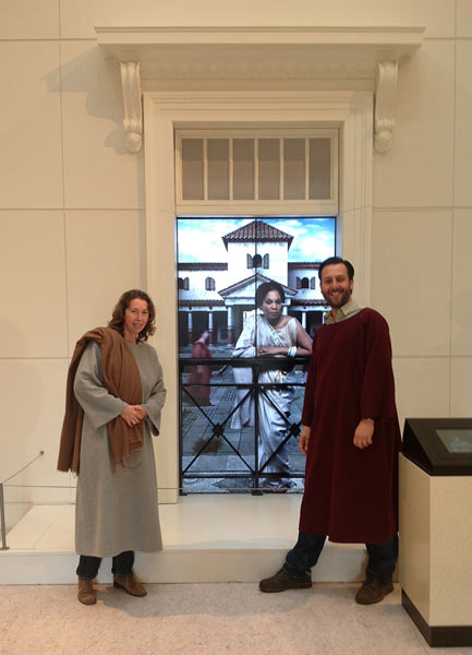 Dr Stephany Leach and Paul Davies dressed as Romans