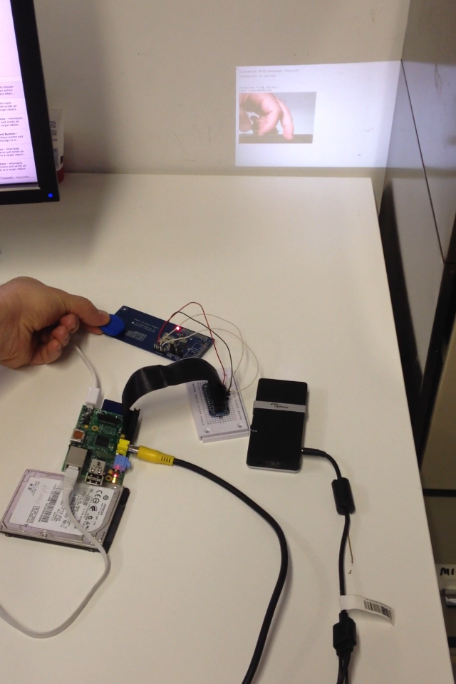 RFID reader detecting tag and playing a video